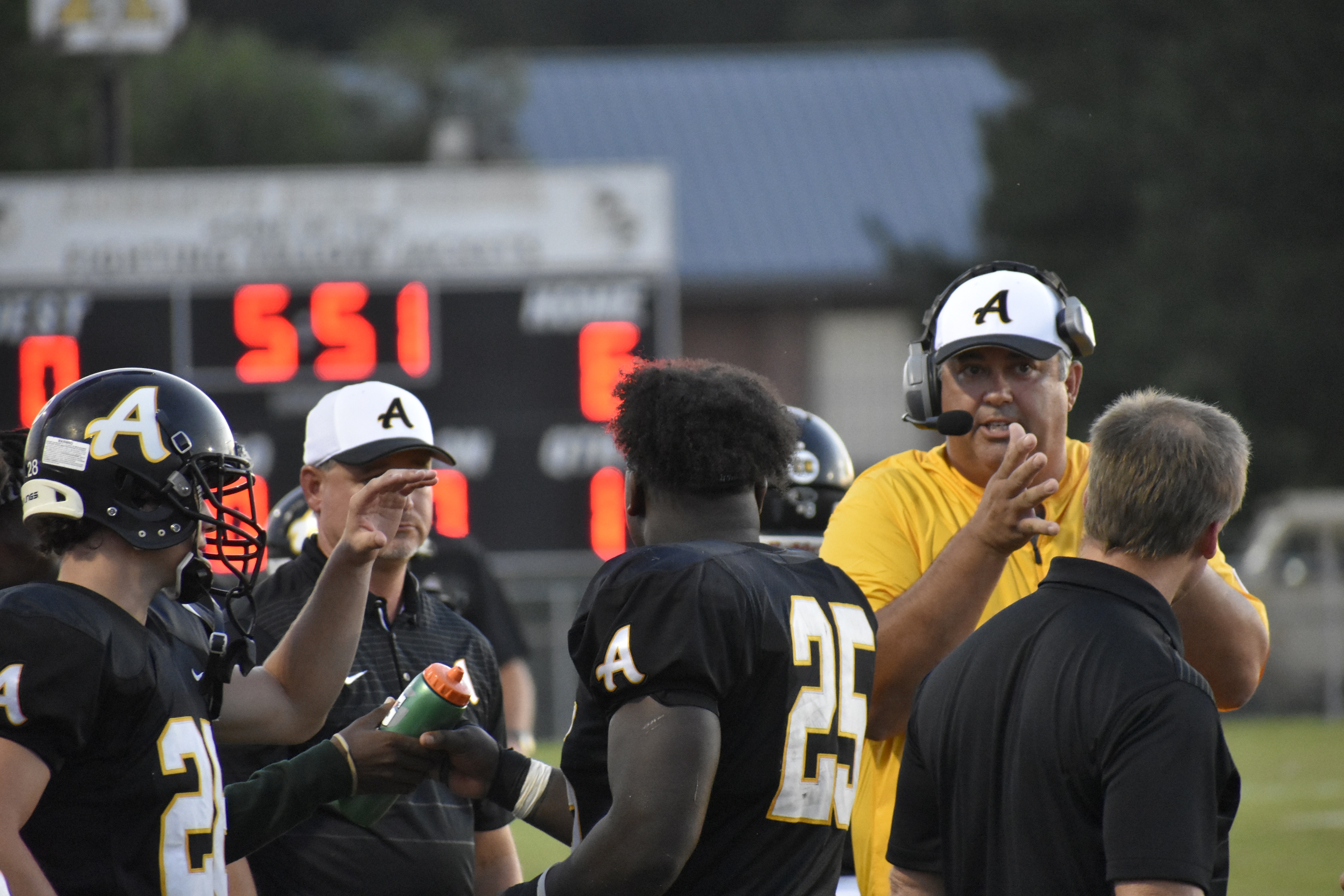 Coach-Durham-andrews-hs-football-with-Players